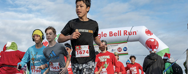 Image of people starting a race at a start line.