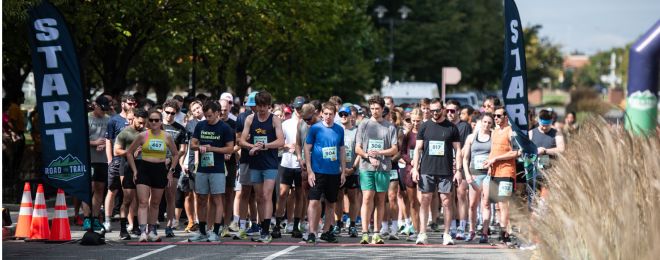 Runners wait at the start line of a 5k race