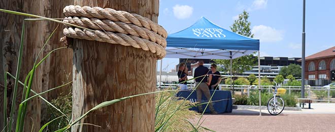 Image of tent and nautical pilings.